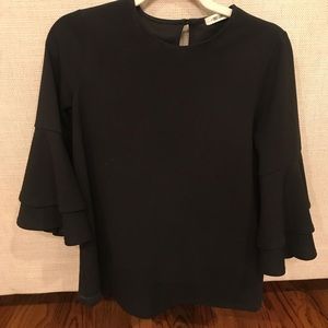 Precious black blouse with bell sleeves